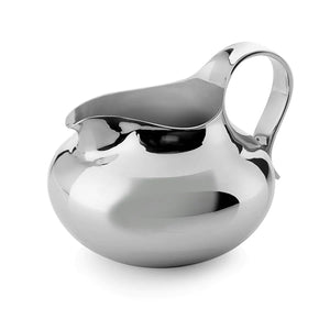Teapot milk jug and a vase